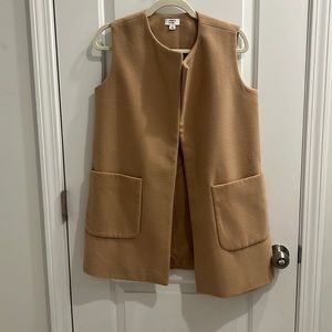 Crown and ivory vest